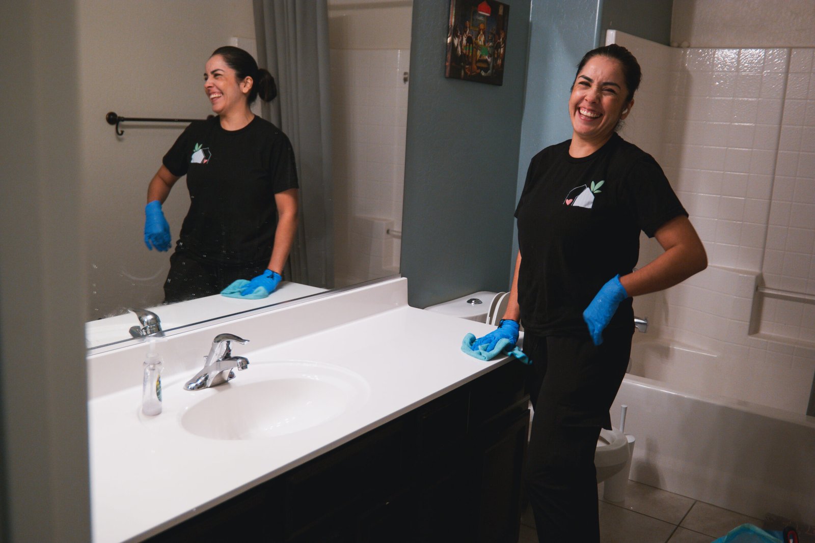 spa-4 Heart & Home team member in clean bathroom